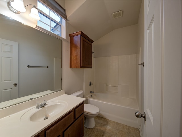 full bathroom with vanity, toilet, shower / bathing tub combination, and vaulted ceiling