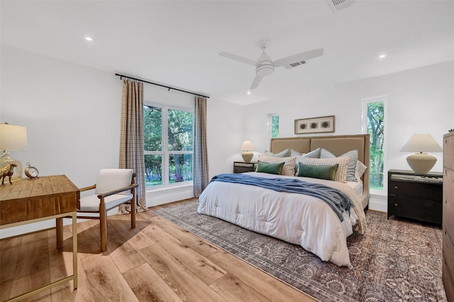 bedroom featuring ceiling fan and wood-type flooring