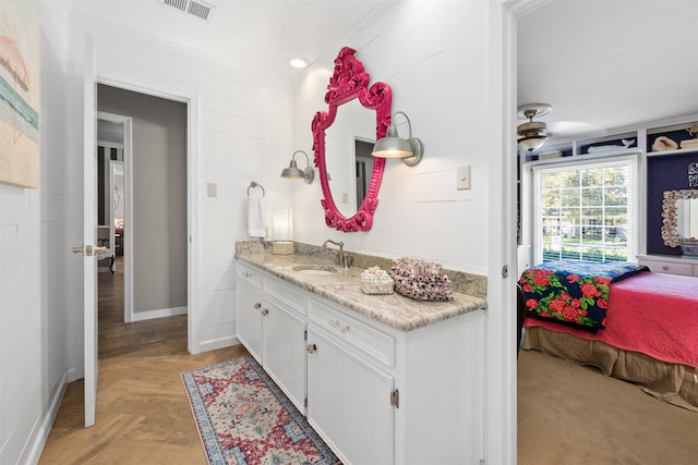7117 Serrano Dr, Benbrook, TX 76126 - bathroom with vanity, baseboards, and connected bathroom