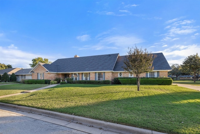 7117 Serrano Dr, Benbrook, TX 76126 - ranch-style house featuring brick siding, a front lawn, and a chimney