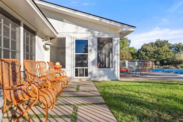 7117 Serrano Dr, Benbrook, TX 76126 - entrance to property with a swimming pool, a lawn, and a patio