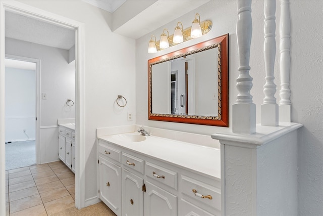 bathroom with vanity and tile patterned flooring