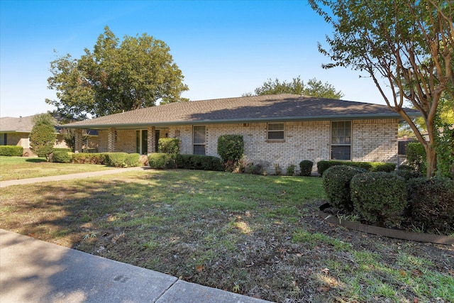 single story home with a front lawn