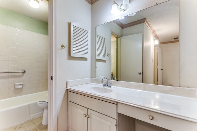 full bathroom with tiled shower / bath combo, vanity, a textured ceiling, and crown molding