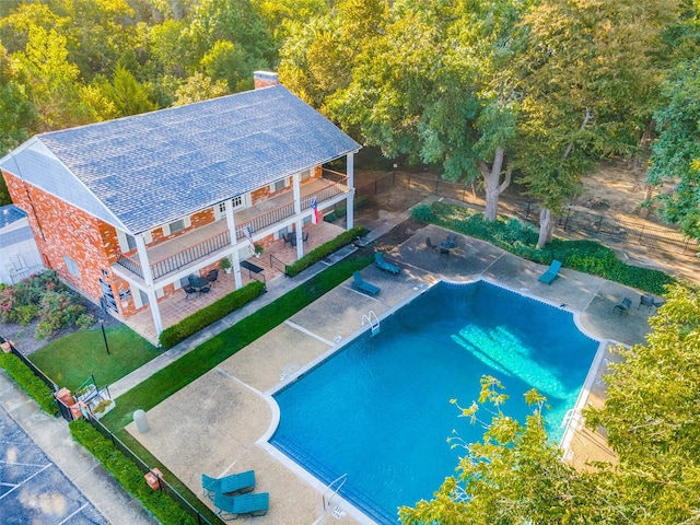 view of pool featuring a patio