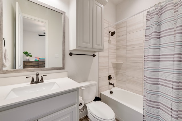 full bathroom with shower / bath combo, vanity, and toilet