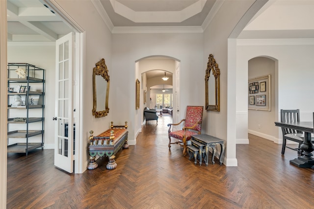 hallway featuring ornamental molding, french doors, and dark parquet flooring