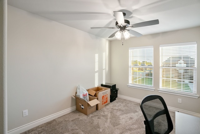 interior space with ceiling fan