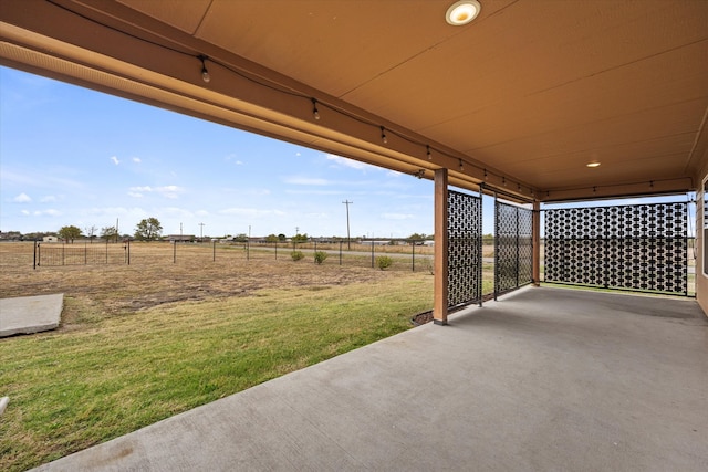 view of patio with a rural view