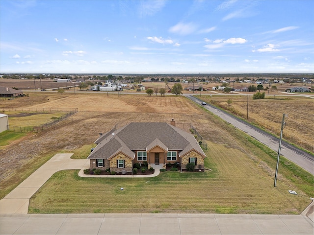 birds eye view of property featuring a rural view