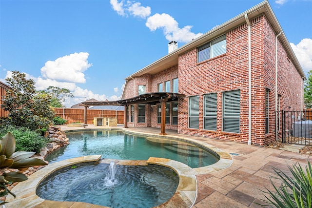 view of pool with a pergola, a patio, and an in ground hot tub