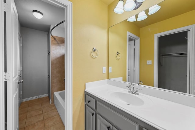 bathroom featuring shower / bathing tub combination, vanity, and tile patterned floors