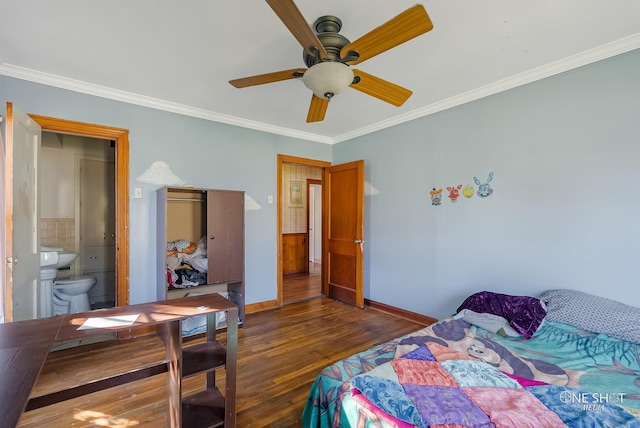 bedroom featuring connected bathroom, ceiling fan, dark hardwood / wood-style floors, and ornamental molding