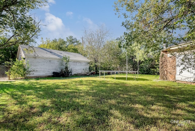 view of yard featuring a trampoline