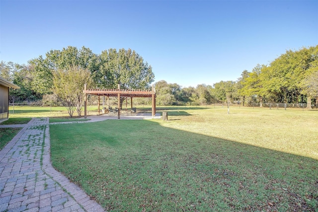 view of yard featuring a patio and a pergola