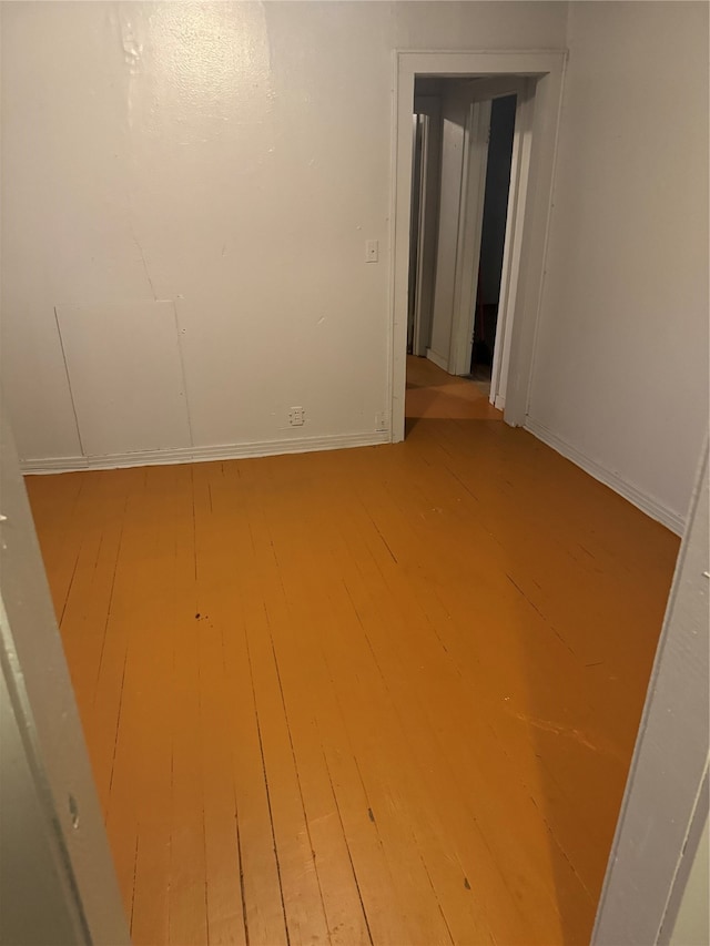 unfurnished room featuring light hardwood / wood-style floors