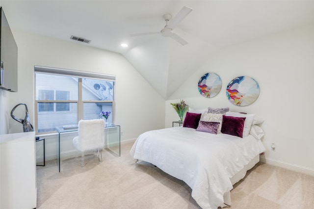 carpeted bedroom featuring lofted ceiling and ceiling fan