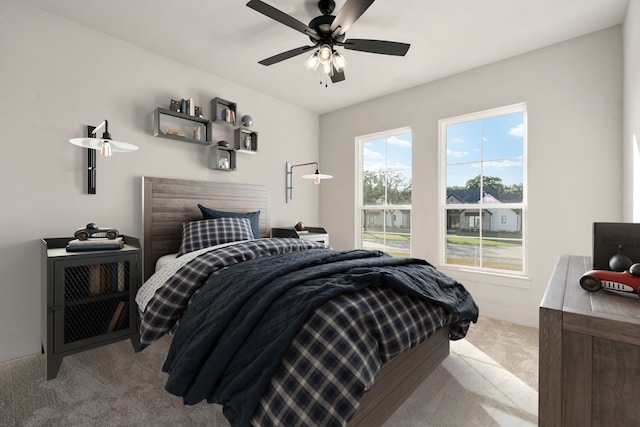 carpeted bedroom with ceiling fan