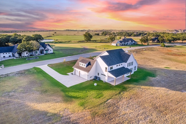 aerial view at dusk with a rural view