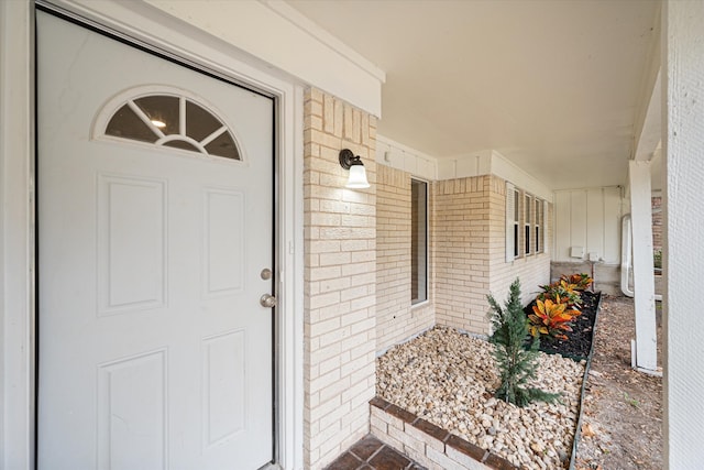 doorway to property with a porch