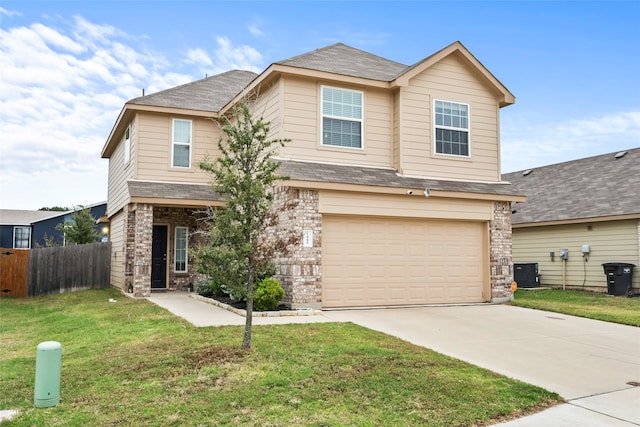 view of front facade featuring a garage, central AC unit, and a front yard