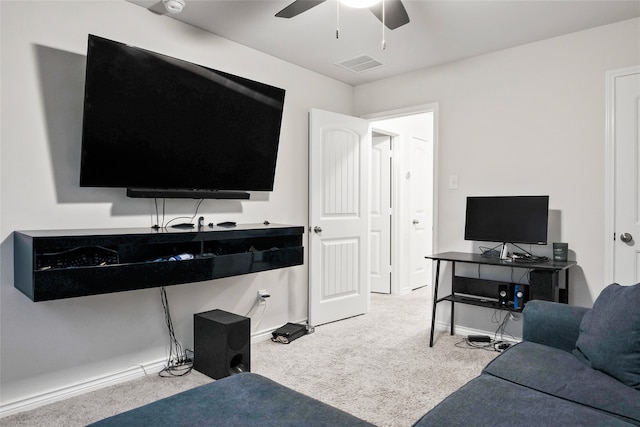 living room featuring ceiling fan and carpet floors