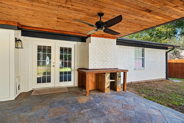 view of patio featuring ceiling fan and french doors