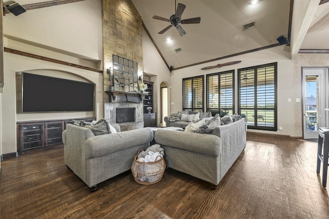 13401 Moorhouse Way, Justin, TX 76247 - living room with a stone fireplace, ceiling fan, dark wood finished floors, baseboards, and visible vents