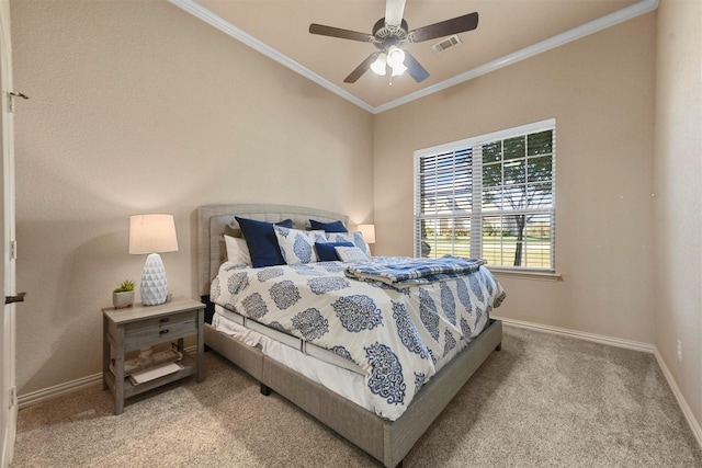 bedroom featuring light carpet, crown molding, and ceiling fan