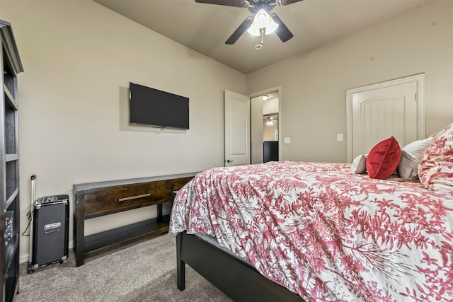 bedroom with ceiling fan and light colored carpet