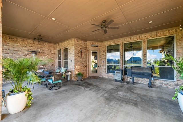 view of patio / terrace featuring ceiling fan