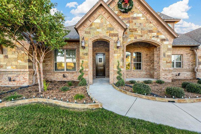 13401 Moorhouse Way, Justin, TX 76247 - view of front of home with stone siding, roof with shingles, and brick siding