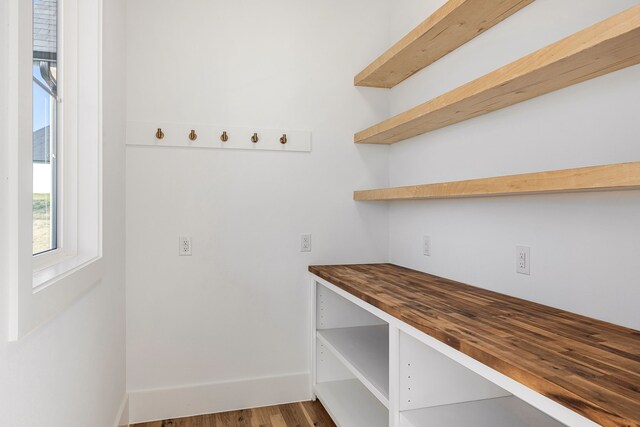 7745 Laura Lake Ln, Fort Worth, TX 76126 - mudroom featuring wood finished floors and baseboards