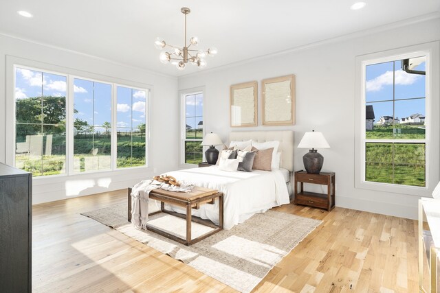 7745 Laura Lake Ln, Fort Worth, TX 76126 - bedroom featuring a chandelier, ornamental molding, light wood-style floors, and recessed lighting