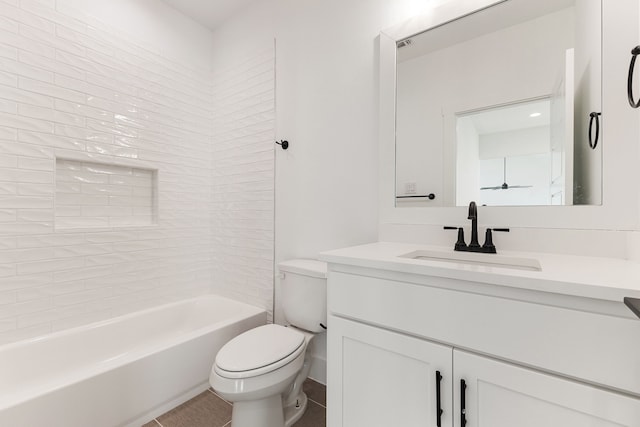 full bathroom featuring  shower combination, tile patterned flooring, vanity, and toilet