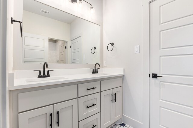 7745 Laura Lake Ln, Fort Worth, TX 76126 - full bathroom featuring double vanity and baseboards