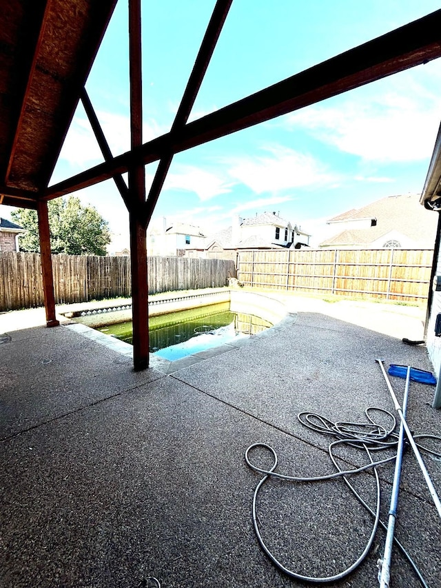 view of patio with a pool