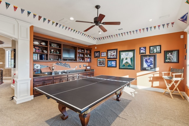 playroom with decorative columns, light carpet, and ceiling fan