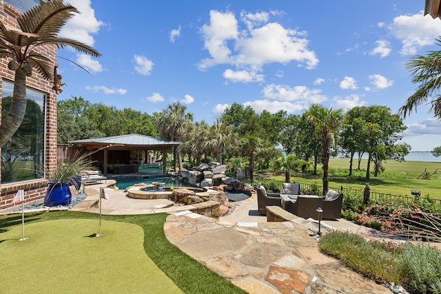 view of patio featuring a gazebo, an outdoor living space, and a swimming pool with hot tub