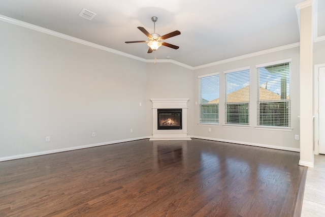 unfurnished living room with ornamental molding, dark hardwood / wood-style flooring, and ceiling fan