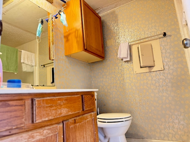 bathroom featuring curtained shower and toilet