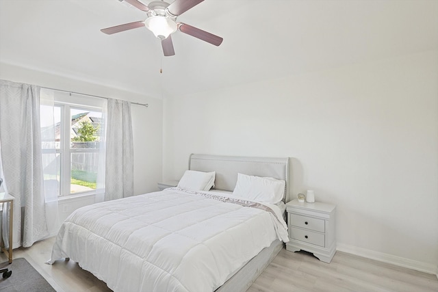 bedroom featuring ceiling fan and light hardwood / wood-style flooring