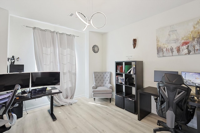 office space featuring light wood-type flooring