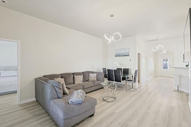 living room with light hardwood / wood-style floors