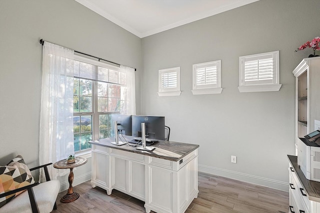 office area with light hardwood / wood-style flooring and ornamental molding