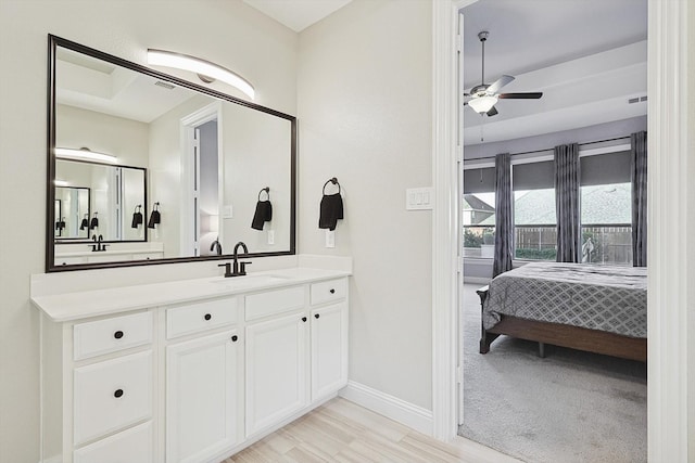 bathroom with vanity and ceiling fan