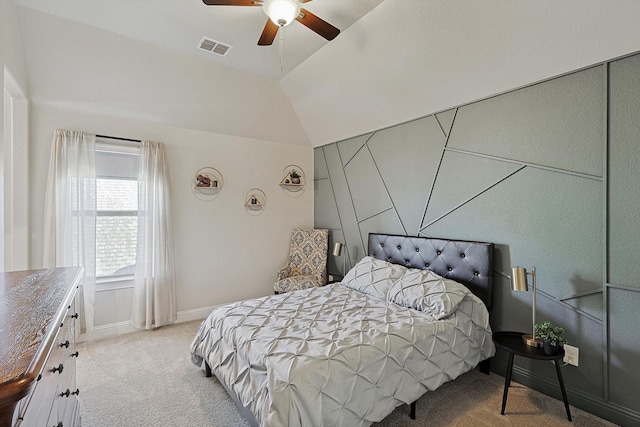 carpeted bedroom featuring ceiling fan and lofted ceiling