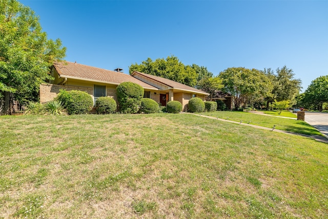 exterior space with a front yard