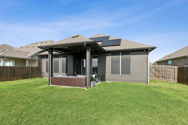 2277 Sheppards Ln, Waxahachie, TX 75167 - back of property featuring solar panels, a shingled roof, and an outdoor living space