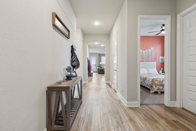 2277 Sheppards Ln, Waxahachie, TX 75167 - hall with arched walkways, light wood-type flooring, baseboards, and recessed lighting